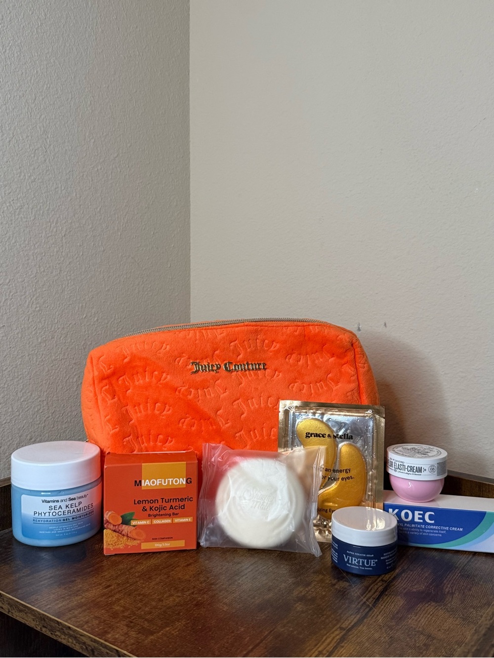 Juicy Couture Bright Orange Quilted Cosmetic Pouch with Skincare Bundle